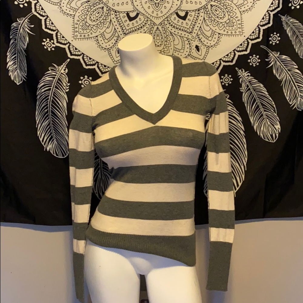 Outer stitched striped sweater